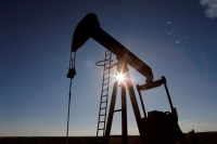 أسعار النفط تغلق على ارتفاع بعد جلسة تداول متذبذبة