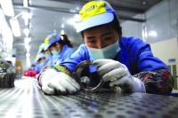 الصين تنهي عاما قويا بمزيد من النمو في قطاع التصنيع