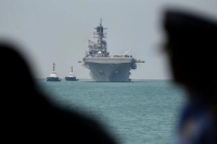 بكين : وجود الجيش الأمريكى في بحر الصين لا يخدم السلام