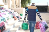 مركز الملك سلمان يوزع 5,427 حقيبة شتوية للاجئين في الأردن