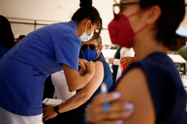 الصين تسجل 14 إصابة جديدة بفيروس كورونا 