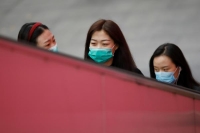الصين تسجل 73 إصابة جديدة بكورونا