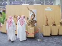 روائع النحت على الخشب تظهر في معرض الصقور والصيد السعودي الدولي