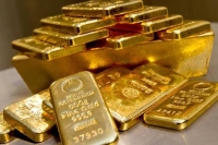 الذهب يتراجع مع تصاعد التوتر في شرق أوروبا