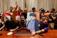 عراقيون يقتحمون البرلمان رفضا لحكومة أذرع إيران