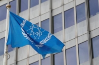 علم الوكالة الدولية للطاقة الذرية يرفرف أمام مقرها في فيينا- رويترز
