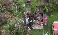 إعصار فيونا يضرب جزر توركس وكايكوس ويتجه صوب برمودا