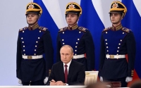 الرئيس الروسي فلاديمير بوتين يعلن التصديق على ضم 4 مناطق أوكرانية لروسيا (رويترز)