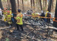 أفراد الإنقاذ يبحثون عن ناجين بعد تحطم طائرة هليكوبتر في كوريا الجنوبية - د ب أ