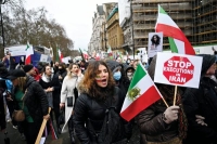مسيرة في لندن تدعو لوقف إرهاب النظام بمواجهة المحتجين السلميين - رويترز