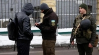 عناصر الأمن الأوكراني في كييف - رويترز