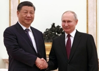 وصفها بعضهما بالصديق العزيز.. بوتين يستقبل الرئيس الصيني في الكرملين