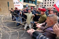 احتجاجات لمتقاعدين عسكريين شهدتها بيروت في 30 مارس - رويترز