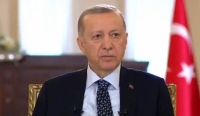 علامات التعب على وجه أردوغان قبل قطع مقابلة تليفزيونية - وكالات