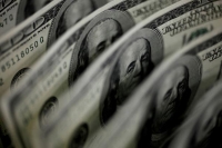 تراجع الدولار الأمريكي مع قرب إعلان سعر الفائدة - رويترز