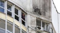 آثار تدمير إحدى المسيرات على مبنى في موسكو - موقع The Moscow Times