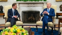بايدن خلال محادثاته مع رئيس الوزراء السويدي أولف كريسترشون - موقع wate