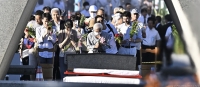 50 ألف ياباني شاركوا في تأبين ضحايا قنبلة هيروشيما - موقع dw