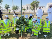 خلال مبادرة زراعة الأشجار بحديقة تلال الدوحة- اليوم