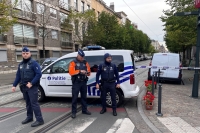 الشرطة تطوق المنطقة بعد عملية للشرطة في سكاربيك بالقرب من بروكسل ببلجيكا - رويترز