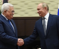 الرئيسان الفلسطيني والروسي في لقاء سابق - رويترز