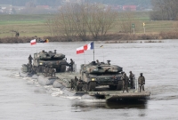 جنود من فرنسا وبولندا يشاركون في مناورة عسكرية مشتركة- د ب أ