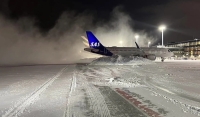 طقس عاصف وثلوج كثيفة تغلق مطار أوسلو مؤقتًا- مشاع إبداعي