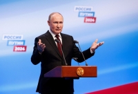بوتين خلال حملته الانتخابية - رويترز