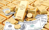 تراجع الدولار يرفع أسعار الذهب - وكالات