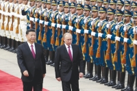 الرئيس الروسي ونظيره الصيني- رويترز (أرشيفية)