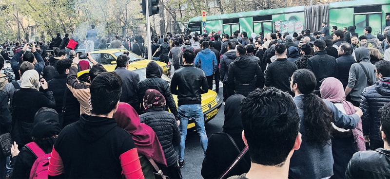 تظاهرات ضد النظام الإيراني في ديسمبر الماضي بطهران (أ ف ب)