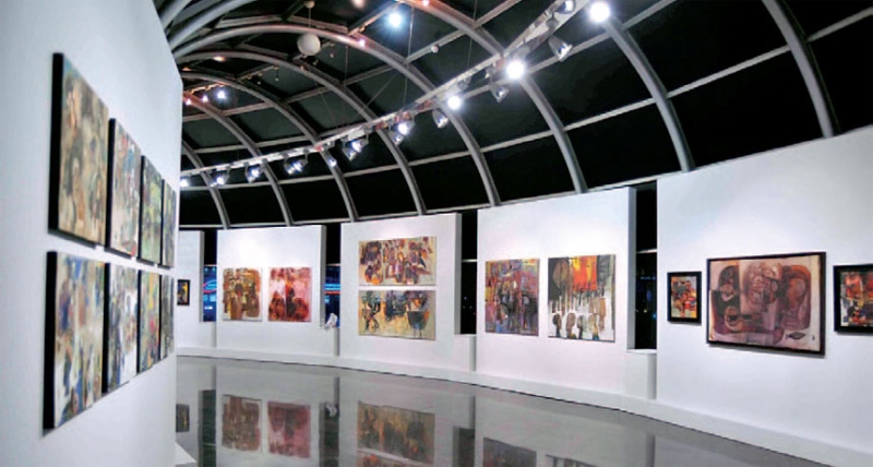 تضمن المعرض 53 لوحة تناولت البيئة السودانية
