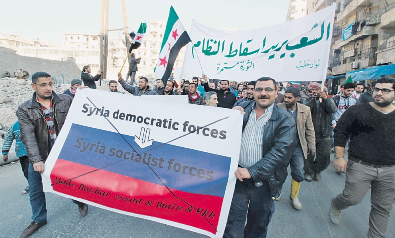 متظاهرون معارضون للأسد في حلب