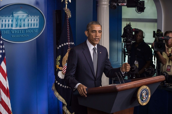 الرئيس الأمريكي باراك أوباما خلال المؤتمر الصحفي (أ ف ب ) 