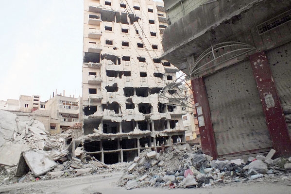 آثار القصف الأسدي المجنون لحمص الأحد