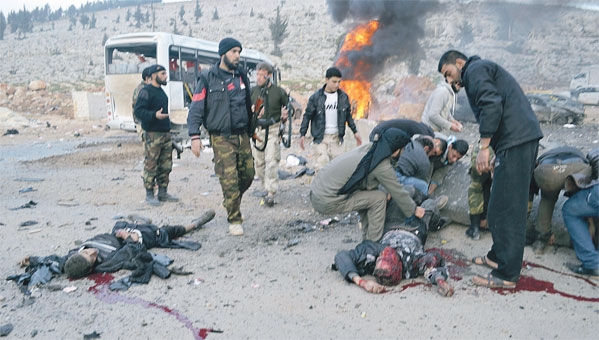 إتهام داعش بتنفيذ تفجيرين في بلدة باب الهوى القريبة من الحدود السورية - التركية راح ضحيتهما 16 قتيلا 