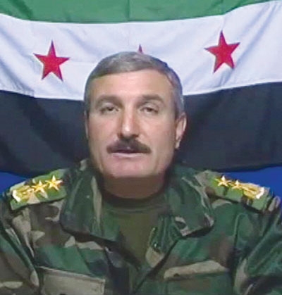 الجيش السوري الحر يعلن إصابة قائده رياض الأسعد في محاولة اغتيال