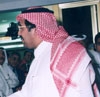 الأمير الوليد يكرم البطل العالمي السعودي علي العتيق