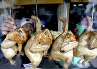  بائع دجاج باحد شوارع ماليزيا