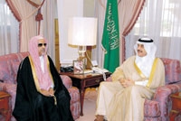 الملا في لقاء سابق مع الأمير محمد بن فهد