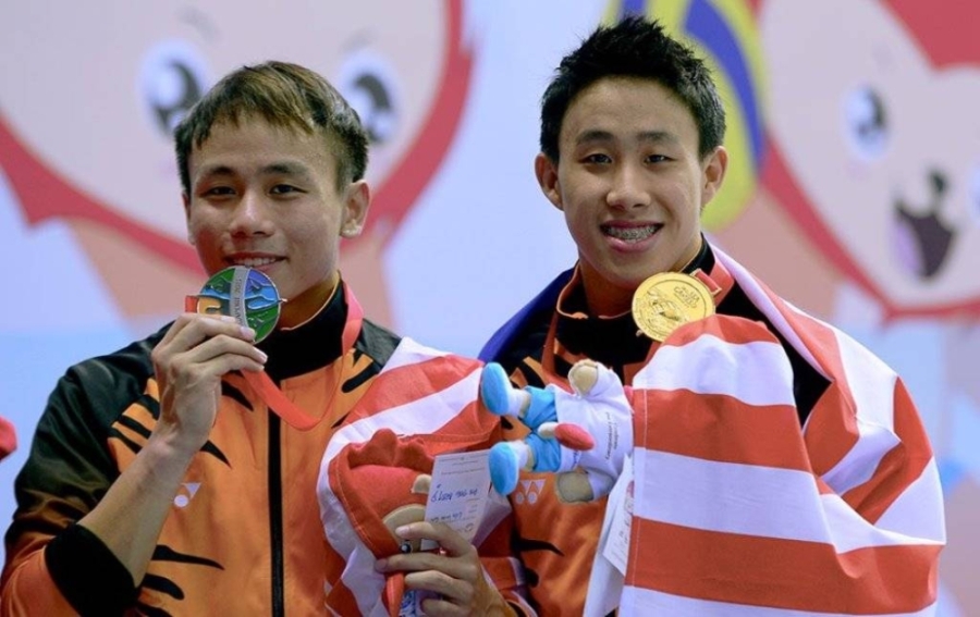 周贻尉/黄兹樑在河内东运会男子双人3米跳板赛项中,为大马代表团斩获本届的第二金,并成功捍卫上届菲律宾东运会的冠军头衔。-摘自#Team Malaysia推特- 周贻尉/黄兹樑在河内东运会男子双人3米跳板赛项中,为大马代表团斩获本届的第二金,并成功捍卫上届菲律宾东运会的冠军头衔。-摘自#Team Malaysia推特-