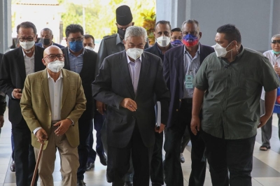 阿末扎希指出,3名在第14届全国大选获胜的巫统国会议员为求自保,相继在大选后退党加入土团党。-Yusof Mat Isa摄- 阿末扎希指出,3名在第14届全国大选获胜的巫统国会议员为求自保,相继在大选后退党加入土团党。-Yusof Mat Isa摄-