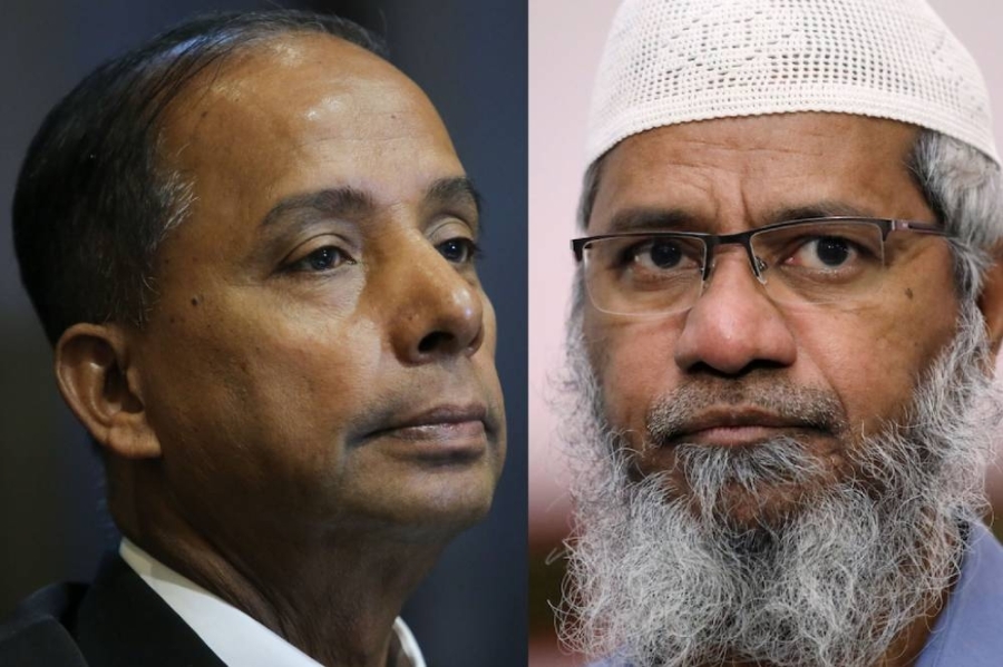 在达成庭外和解时,古拉(左)和查基尔纳益皆现身庭内。-Yusof Mat Isa摄- 在达成庭外和解时,古拉(左)和查基尔纳益皆现身庭内。-Yusof Mat Isa摄-