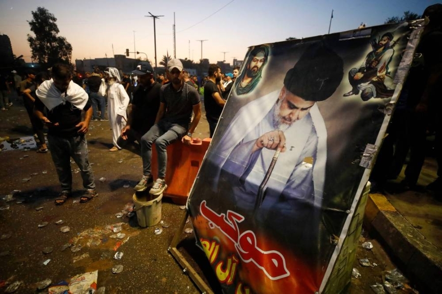 伊拉克什叶派领袖萨德尔突然退出政坛,引发支持者示威,并与安全部队爆发冲突,至少15人死亡。-法新社- 伊拉克什叶派领袖萨德尔突然退出政坛,引发支持者示威,并与安全部队爆发冲突,至少15人死亡。-法新社-