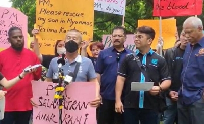 多个非政府组织联合向首相提呈备忘录,要求政府关注国人被“卖猪仔”的问题。-马新社- 多个非政府组织联合向首相提呈备忘录,要求政府关注国人被“卖猪仔”的问题。-马新社-