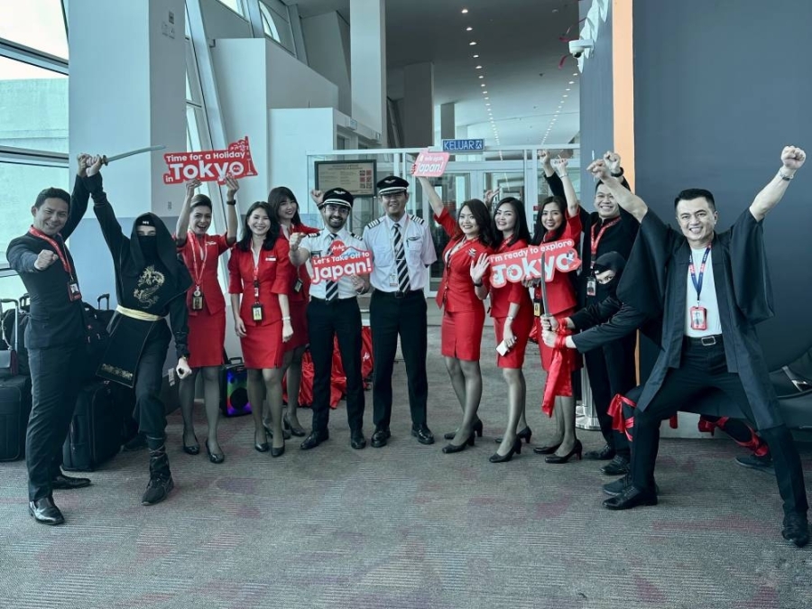 为了庆祝恢复飞往日本的航班,亚航长程在吉隆坡第二国际机场(klia2)举行送机仪式,并为乘客提供有趣的活动和赠品。-亚航提供- 为了庆祝恢复飞往日本的航班,亚航长程在吉隆坡第二国际机场(klia2)举行送机仪式,并为乘客提供有趣的活动和赠品。-亚航提供-
