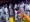 网上流传的视频截图显示，在11月29日晚广州市海珠区的警民冲突中，大批身穿防疫服的警员手持盾牌列队前进。-路透社-