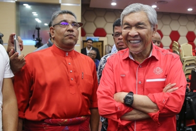 根据巫统党选成绩显示,阿末扎希阵营依然牢牢掌控该党。-Yusof Mat Isa摄- 根据巫统党选成绩显示,阿末扎希阵营依然牢牢掌控该党。-Yusof Mat Isa摄-