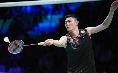 即将在下周羽球亚锦赛展开卫冕之旅的李梓嘉,首圈就遭遇近期与之交手二连败的香港好手伍家朗“考验”。-法新社- 即将在下周羽球亚锦赛展开卫冕之旅的李梓嘉,首圈就遭遇近期与之交手二连败的香港好手伍家朗“考验”。-法新社-