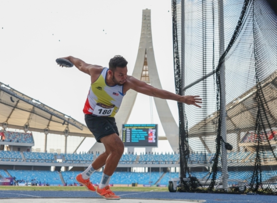 伊凡周四在柬埔寨东运会田径赛男子铁饼决赛中,成功摘得金牌,完成6连冠的壮举。-马新社- 伊凡周四在柬埔寨东运会田径赛男子铁饼决赛中,成功摘得金牌,完成6连冠的壮举。-马新社-